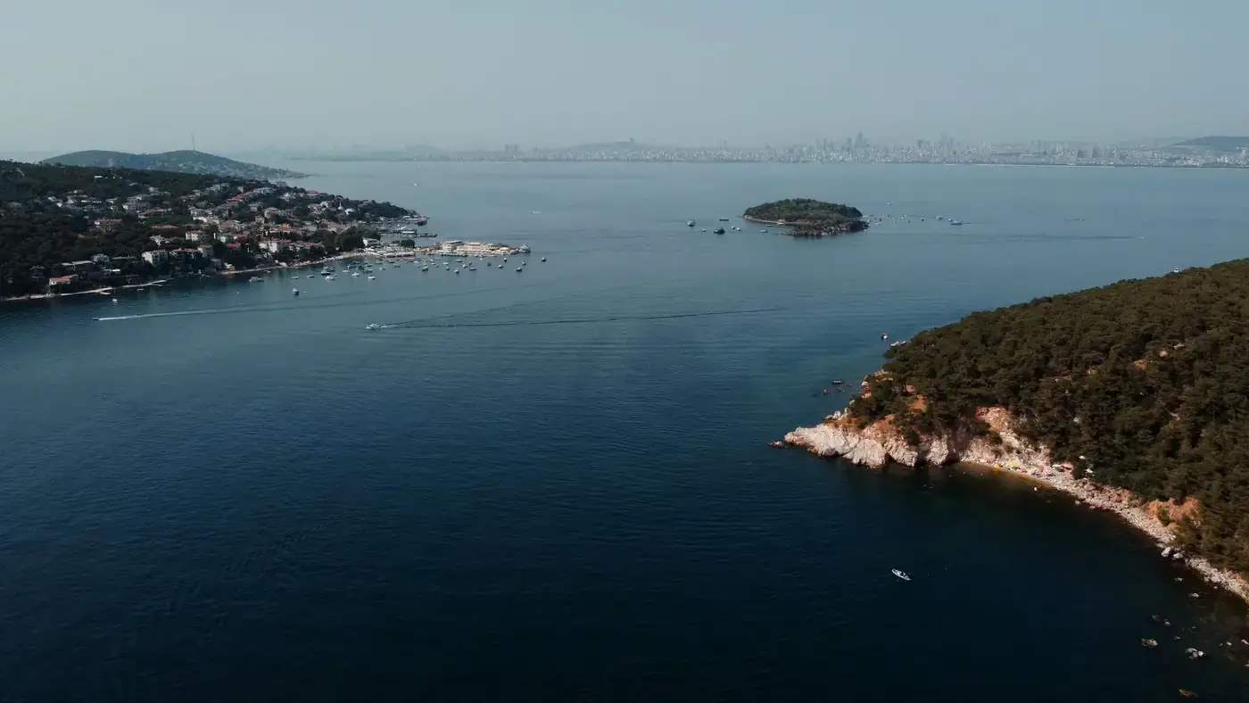 Aerial photography of Heybeliada Island with the Istanbul skyline in the background.