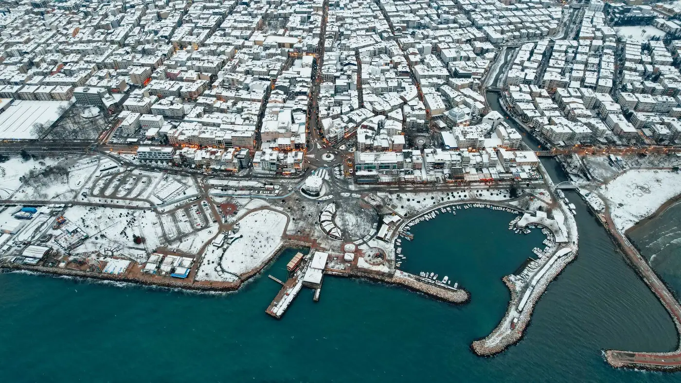 Explore the snow-covered urban landscape of Yalova, Turkey, captured from above.
